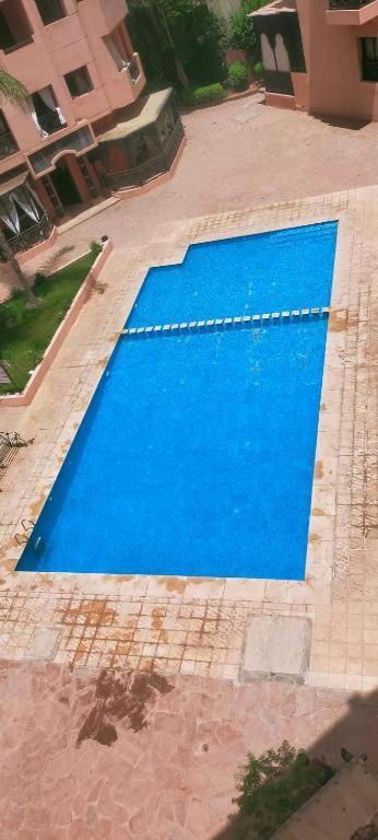 Un Moderne Chic Appartement Vue Sur Piscine Marrakesh Exterior photo